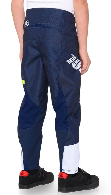 Spodnie juniorskie 100% R-CORE Pants dark blue yellow roz. 26 (40 EUR) (NEW)